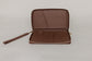 Pairre 4P passport wallet in brown leather — open interior showing four passport slots and boarding pass pocket