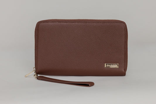 Pairre 4P brown leather passport wallet - close up of PVD gold Pairre hardware plate