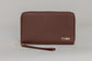 Pairre 4P brown leather passport wallet - close up of PVD gold Pairre hardware plate