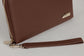 Pairre 4P passport wallet in brown/espresso full-grain leather — closed exterior showing PVD gold hardware