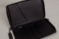 Pairre 4P passport wallet in black leather — open interior showing four passport slots and boarding pass pocket