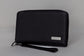 Pairre 2P black leather passport wallet - close up of PVD gold Pairre hardware plate