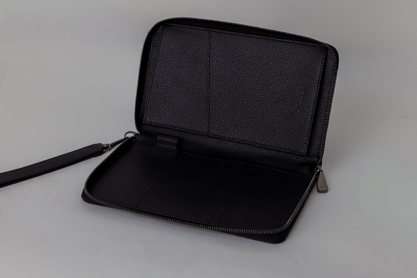 Pairre 2P passport wallet in black leather - open interior showing passport slots and card pockets