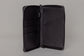Pairre 4P passport wallet in black leather — open interior showing four passport slots and boarding pass pocket