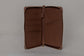 Pairre 4P passport wallet in brown leather — open interior showing four passport slots and boarding pass pocket