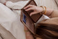 Pairre 2P brown leather passport wallet with wrist strap - lifestyle shot